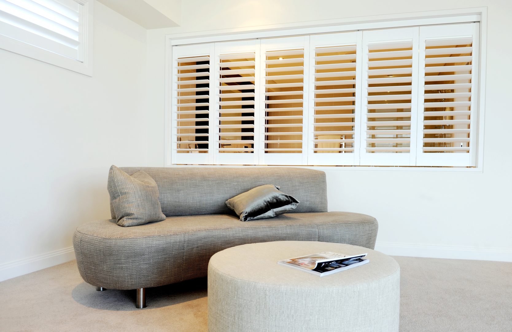 White Multifold Plantation Shutters